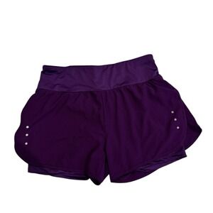 Women's Purple tights underneath Athletic Shorts